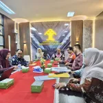 Pemkab Kampar Bahas Rancangan Perbup Pengelolaan Perparkiran di Kementerian Hukum Riau